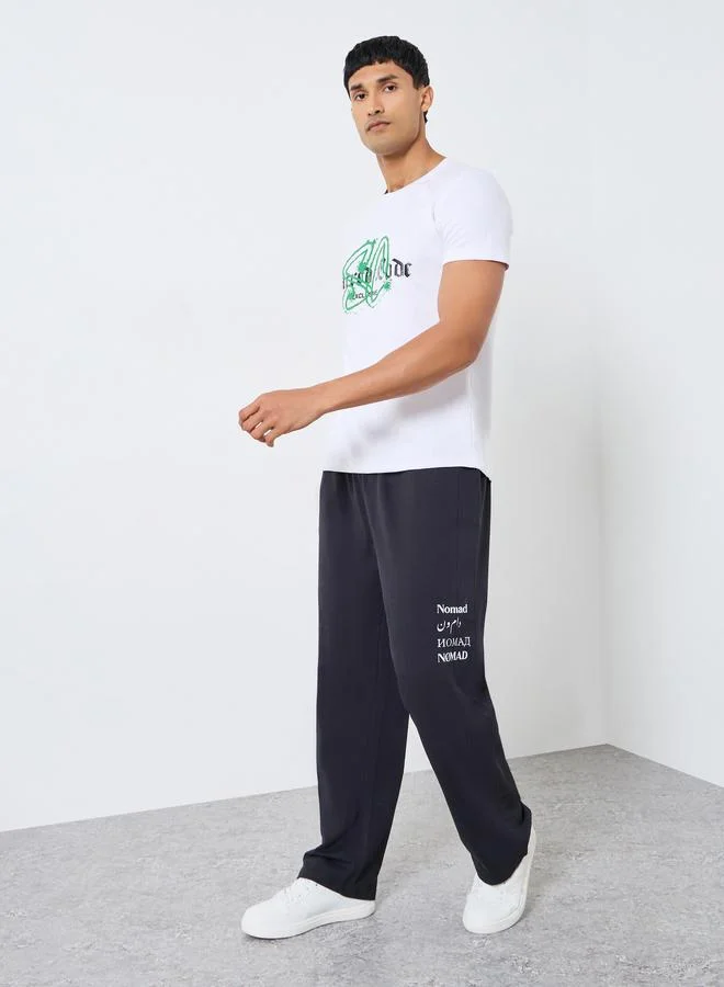 Men Black Slogan Print Relaxed Joggers